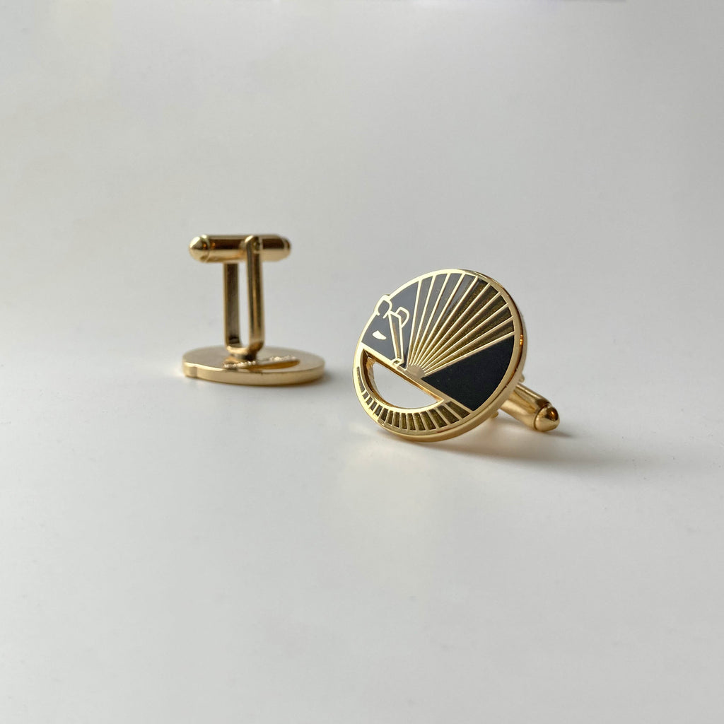 Reverse detail: Karmadillo black enamel armadillo cufflinks seconds finished in 24k gold showing bullet toggle backs.