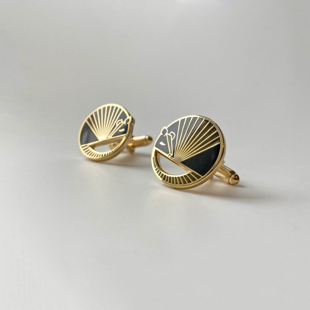 Karmadillo black enamel armadillo cufflinks seconds finished in 24k gold with bullet toggle backs.